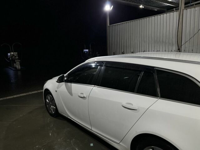 Белый Опель Инсигния, объемом двигателя 2 л и пробегом 325 тыс. км за 6599 $, фото 7 на Automoto.ua