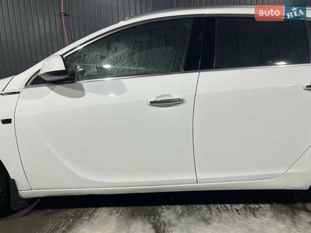 Білий Опель Інсігнія, об'ємом двигуна 2 л та пробігом 263 тис. км за 7700 $, фото 6 на Automoto.ua