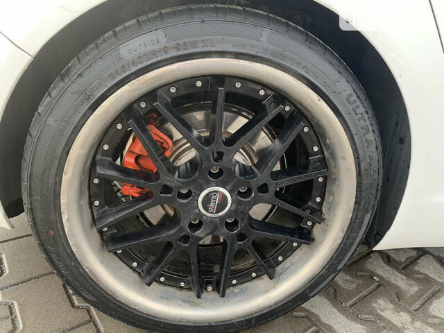 Білий Опель Інсігнія, об'ємом двигуна 1.96 л та пробігом 235 тис. км за 8700 $, фото 29 на Automoto.ua