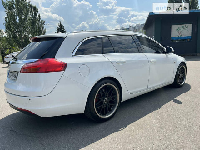 Білий Опель Інсігнія, об'ємом двигуна 1.96 л та пробігом 235 тис. км за 8700 $, фото 13 на Automoto.ua