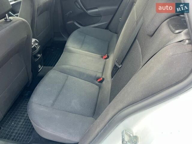 Белый Опель Инсигния, объемом двигателя 1.96 л и пробегом 236 тыс. км за 7800 $, фото 24 на Automoto.ua