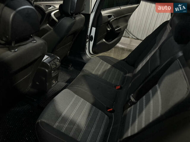 Белый Опель Инсигния, объемом двигателя 1.96 л и пробегом 295 тыс. км за 6450 $, фото 9 на Automoto.ua