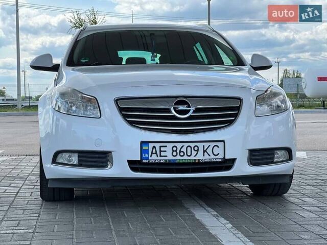 Білий Опель Інсігнія, об'ємом двигуна 2 л та пробігом 290 тис. км за 7900 $, фото 5 на Automoto.ua