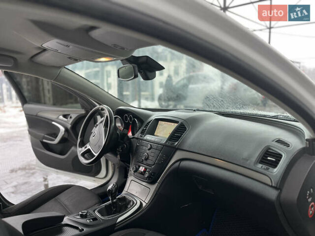 Белый Опель Инсигния, объемом двигателя 1.96 л и пробегом 235 тыс. км за 6450 $, фото 13 на Automoto.ua