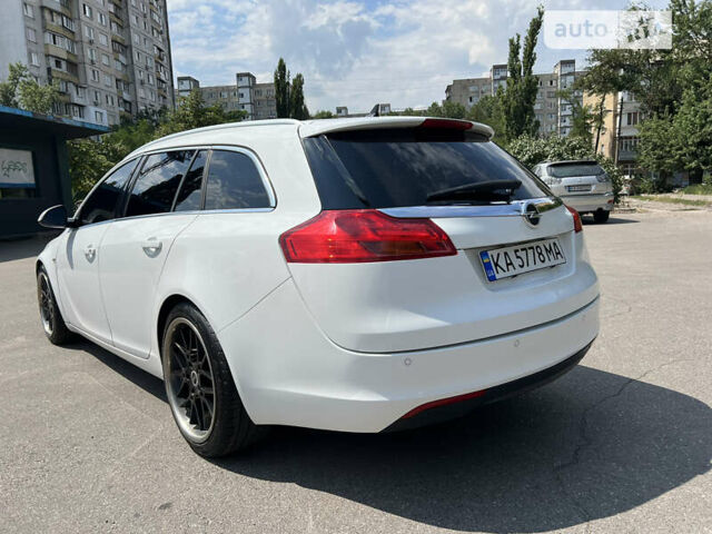 Білий Опель Інсігнія, об'ємом двигуна 1.96 л та пробігом 235 тис. км за 8700 $, фото 8 на Automoto.ua