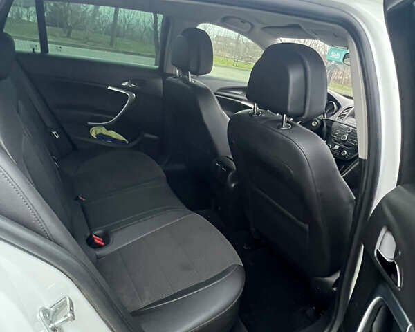 Белый Опель Инсигния, объемом двигателя 1.96 л и пробегом 324 тыс. км за 7100 $, фото 11 на Automoto.ua