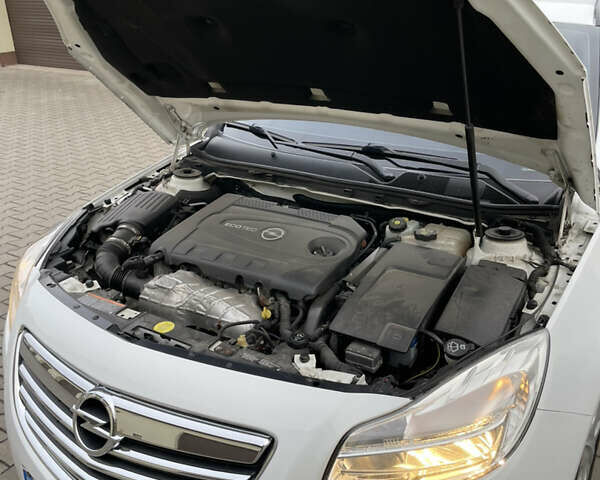 Белый Опель Инсигния, объемом двигателя 1.96 л и пробегом 260 тыс. км за 7700 $, фото 22 на Automoto.ua