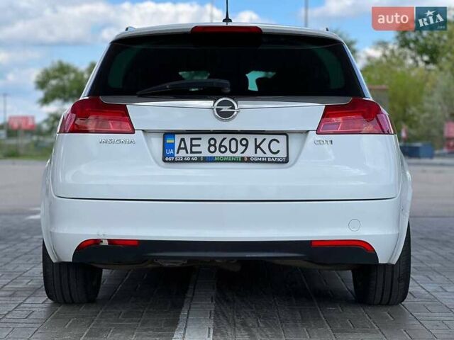 Білий Опель Інсігнія, об'ємом двигуна 2 л та пробігом 290 тис. км за 7900 $, фото 7 на Automoto.ua