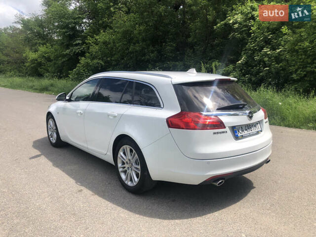 Білий Опель Інсігнія, об'ємом двигуна 2 л та пробігом 324 тис. км за 6600 $, фото 6 на Automoto.ua