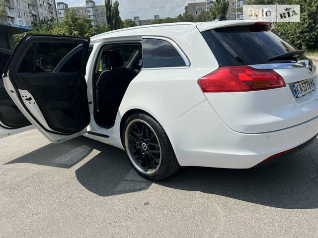 Білий Опель Інсігнія, об'ємом двигуна 1.96 л та пробігом 235 тис. км за 8700 $, фото 6 на Automoto.ua