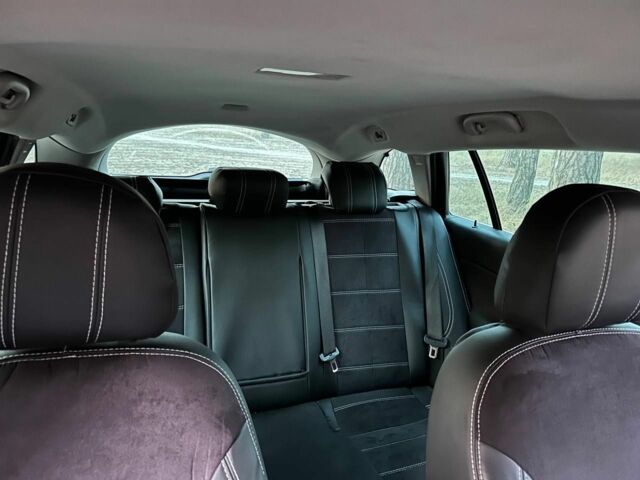 Білий Опель Інсігнія, об'ємом двигуна 2 л та пробігом 281 тис. км за 7000 $, фото 10 на Automoto.ua