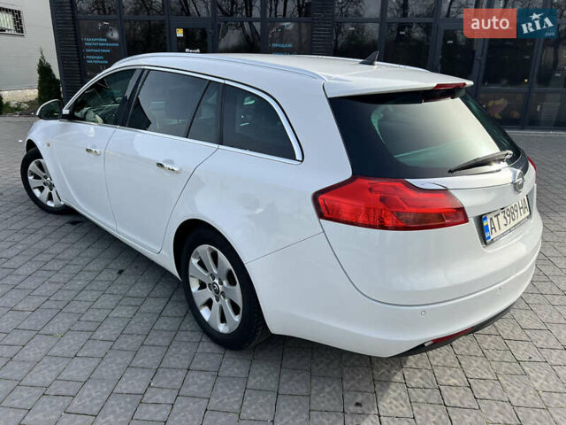 Білий Опель Інсігнія, об'ємом двигуна 1.96 л та пробігом 141 тис. км за 9800 $, фото 7 на Automoto.ua