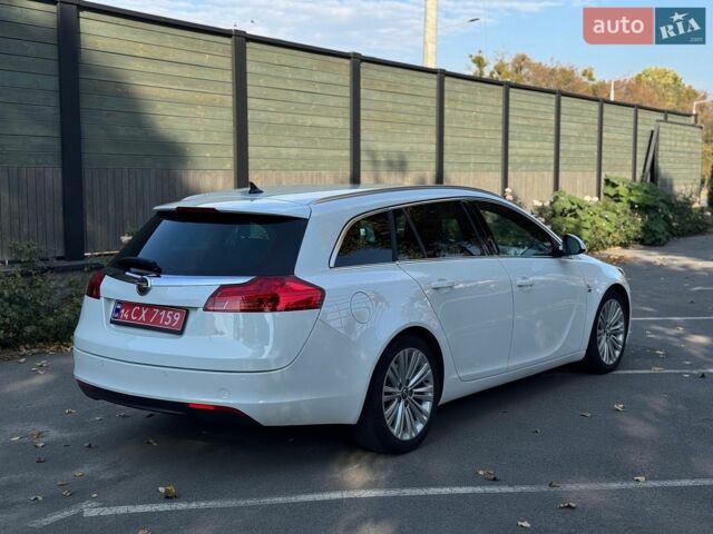 Белый Опель Инсигния, объемом двигателя 2 л и пробегом 130 тыс. км за 9300 $, фото 26 на Automoto.ua