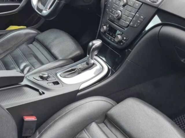 Білий Опель Інсігнія, об'ємом двигуна 2 л та пробігом 325 тис. км за 7600 $, фото 4 на Automoto.ua