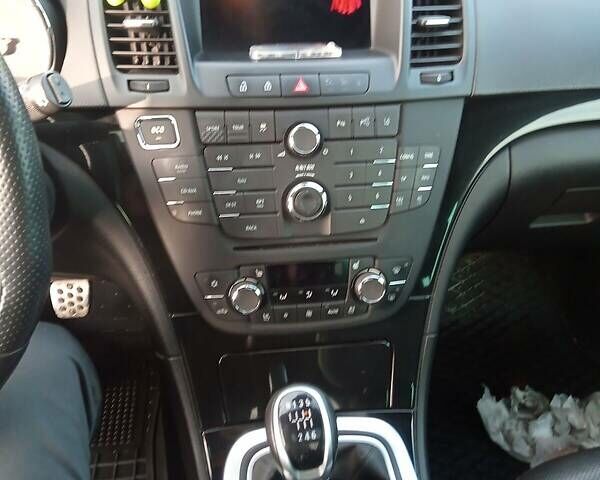 Белый Опель Инсигния, объемом двигателя 2 л и пробегом 210 тыс. км за 8800 $, фото 10 на Automoto.ua