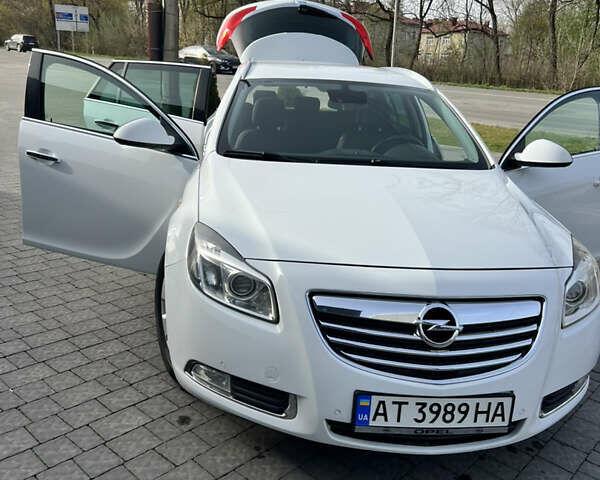 Білий Опель Інсігнія, об'ємом двигуна 1.96 л та пробігом 141 тис. км за 9800 $, фото 29 на Automoto.ua