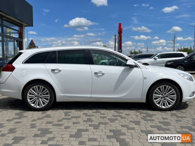 Белый Опель Инсигния, объемом двигателя 2 л и пробегом 213 тыс. км за 9900 $, фото 7 на Automoto.ua