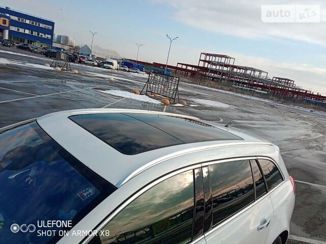 Белый Опель Инсигния, объемом двигателя 2 л и пробегом 210 тыс. км за 8800 $, фото 6 на Automoto.ua