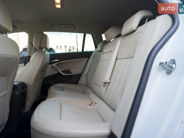 Білий Опель Інсігнія, об'ємом двигуна 1.96 л та пробігом 239 тис. км за 10300 $, фото 23 на Automoto.ua