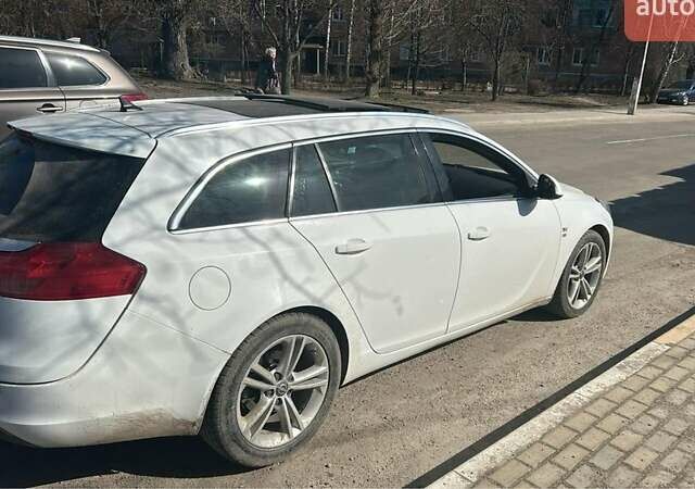 Белый Опель Инсигния, объемом двигателя 2 л и пробегом 270 тыс. км за 8600 $, фото 7 на Automoto.ua