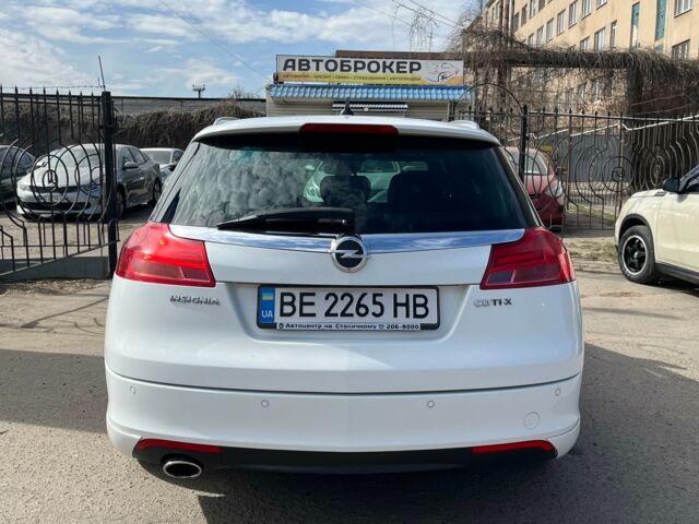 Білий Опель Інсігнія, об'ємом двигуна 2 л та пробігом 229 тис. км за 9900 $, фото 6 на Automoto.ua