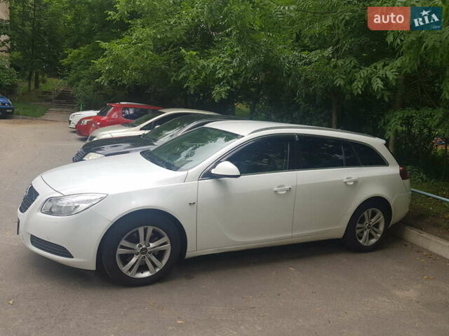 Білий Опель Інсігнія, об'ємом двигуна 1.96 л та пробігом 300 тис. км за 9700 $, фото 2 на Automoto.ua