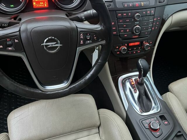 Білий Опель Інсігнія, об'ємом двигуна 0 л та пробігом 251 тис. км за 6449 $, фото 13 на Automoto.ua