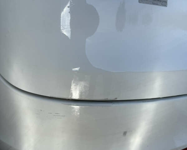 Белый Опель Инсигния, объемом двигателя 1.96 л и пробегом 345 тыс. км за 7500 $, фото 14 на Automoto.ua