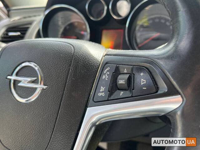Белый Опель Инсигния, объемом двигателя 2 л и пробегом 213 тыс. км за 9900 $, фото 15 на Automoto.ua