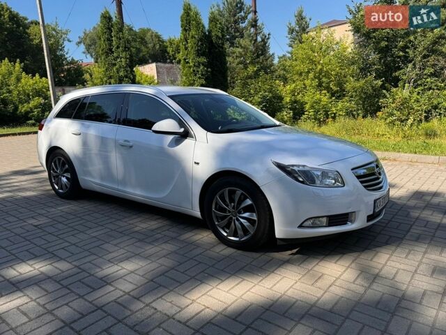Білий Опель Інсігнія, об'ємом двигуна 2 л та пробігом 256 тис. км за 7999 $, фото 17 на Automoto.ua