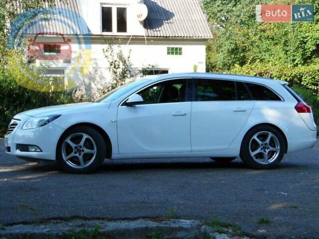 Білий Опель Інсігнія, об'ємом двигуна 1.96 л та пробігом 270 тис. км за 7700 $, фото 7 на Automoto.ua