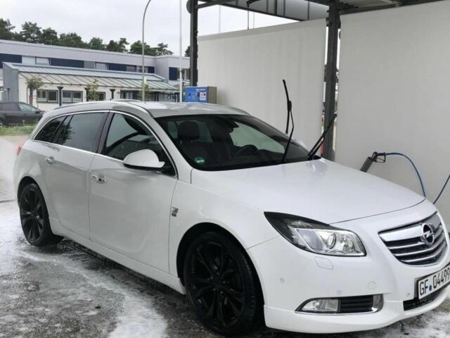 Білий Опель Інсігнія, об'ємом двигуна 2 л та пробігом 325 тис. км за 7600 $, фото 2 на Automoto.ua