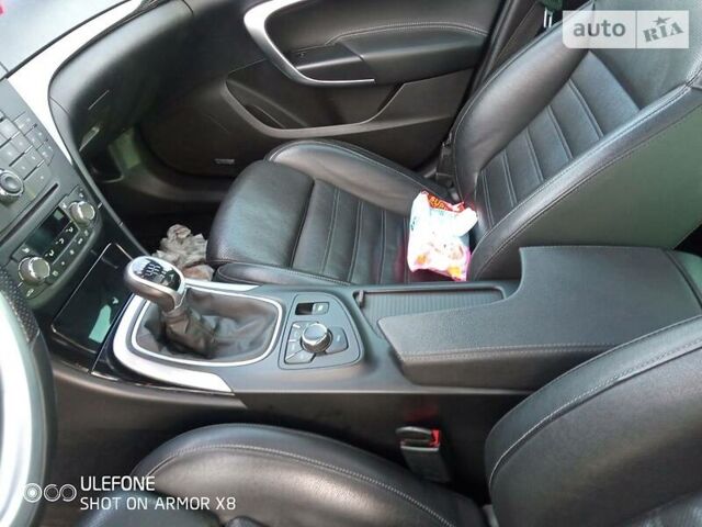 Белый Опель Инсигния, объемом двигателя 2 л и пробегом 210 тыс. км за 8800 $, фото 9 на Automoto.ua