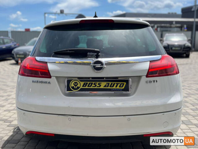 Белый Опель Инсигния, объемом двигателя 2 л и пробегом 213 тыс. км за 9900 $, фото 5 на Automoto.ua