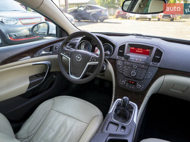 Білий Опель Інсігнія, об'ємом двигуна 1.96 л та пробігом 239 тис. км за 10300 $, фото 15 на Automoto.ua