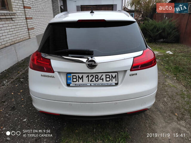Белый Опель Инсигния, объемом двигателя 2 л и пробегом 186 тыс. км за 9500 $, фото 3 на Automoto.ua