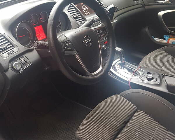 Білий Опель Інсігнія, об'ємом двигуна 1.96 л та пробігом 300 тис. км за 9700 $, фото 1 на Automoto.ua