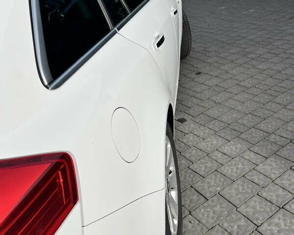 Білий Опель Інсігнія, об'ємом двигуна 1.96 л та пробігом 141 тис. км за 9800 $, фото 9 на Automoto.ua