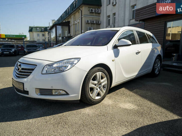 Білий Опель Інсігнія, об'ємом двигуна 1.96 л та пробігом 239 тис. км за 10300 $, фото 2 на Automoto.ua