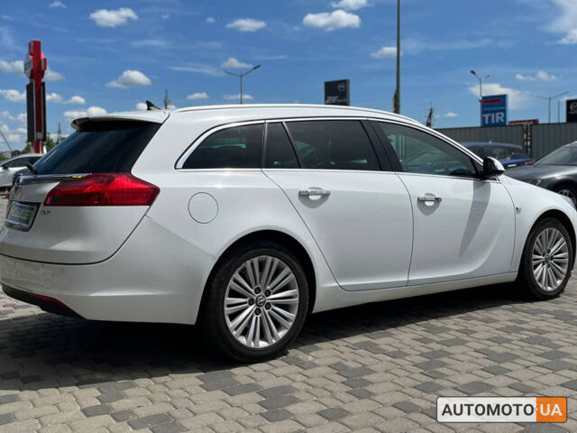 Белый Опель Инсигния, объемом двигателя 2 л и пробегом 213 тыс. км за 9900 $, фото 6 на Automoto.ua