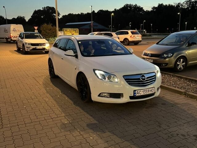 Білий Опель Інсігнія, об'ємом двигуна 2 л та пробігом 325 тис. км за 7600 $, фото 3 на Automoto.ua