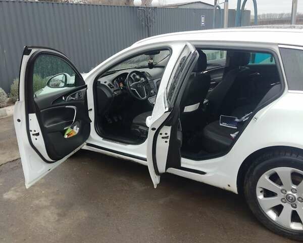 Белый Опель Инсигния, объемом двигателя 1.96 л и пробегом 324 тыс. км за 6600 $, фото 13 на Automoto.ua