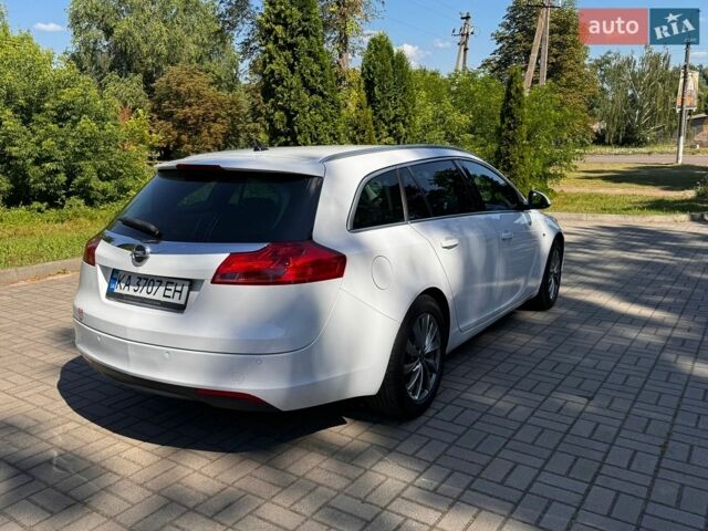 Білий Опель Інсігнія, об'ємом двигуна 2 л та пробігом 256 тис. км за 7999 $, фото 16 на Automoto.ua
