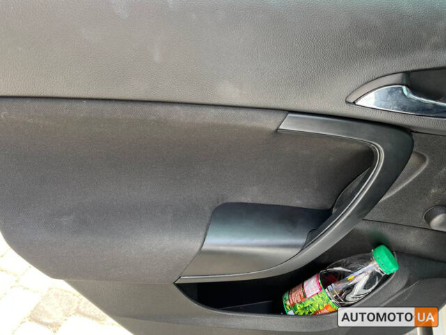 Белый Опель Инсигния, объемом двигателя 2 л и пробегом 213 тыс. км за 9900 $, фото 22 на Automoto.ua