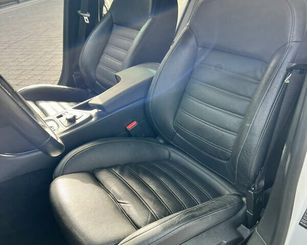 Білий Опель Інсігнія, об'ємом двигуна 1.96 л та пробігом 141 тис. км за 9800 $, фото 25 на Automoto.ua