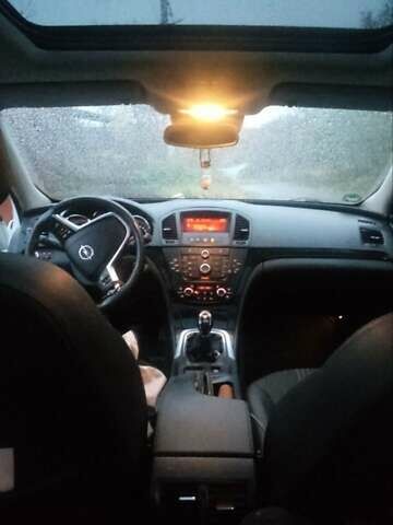 Білий Опель Інсігнія, об'ємом двигуна 1.96 л та пробігом 318 тис. км за 7000 $, фото 14 на Automoto.ua