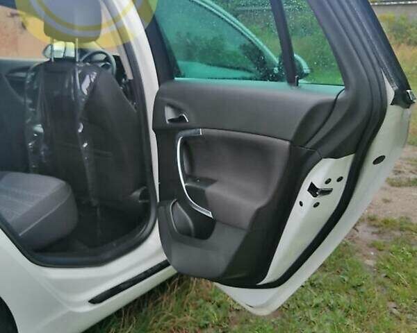 Білий Опель Інсігнія, об'ємом двигуна 1.96 л та пробігом 270 тис. км за 7700 $, фото 19 на Automoto.ua