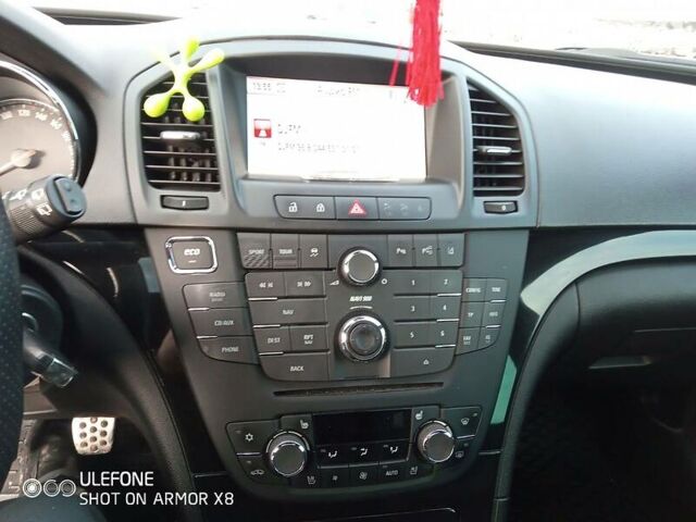 Белый Опель Инсигния, объемом двигателя 2 л и пробегом 210 тыс. км за 8800 $, фото 12 на Automoto.ua