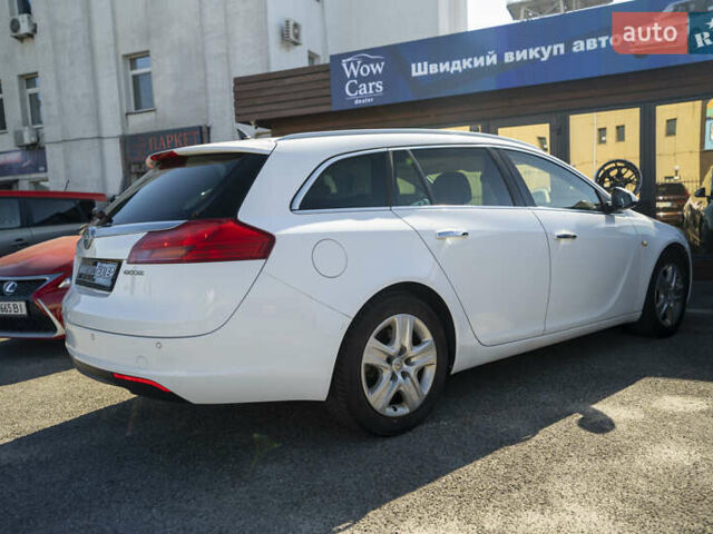 Білий Опель Інсігнія, об'ємом двигуна 1.96 л та пробігом 239 тис. км за 10300 $, фото 10 на Automoto.ua