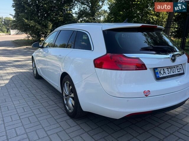 Білий Опель Інсігнія, об'ємом двигуна 2 л та пробігом 256 тис. км за 7999 $, фото 3 на Automoto.ua